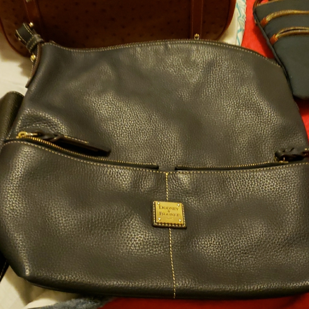 Dooney and Burke purses all five for sale at once